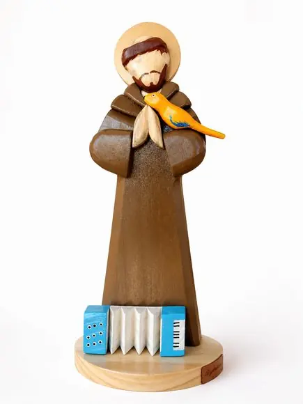 São Francisquinho com vela e incensos