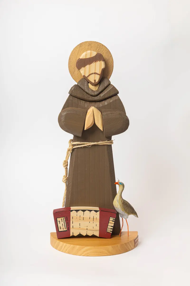São Francisco com sanfona vermelha e ave do sertão